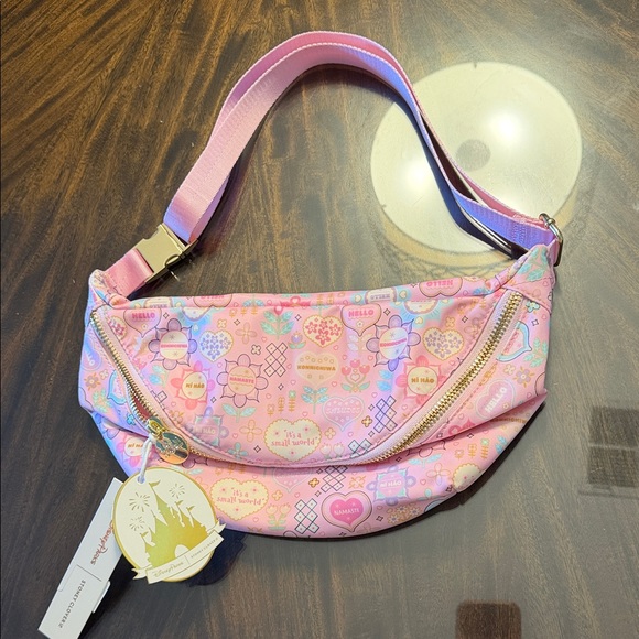 Stoney Clover Lane Handbags - NWT disney Stoney cover lane jumbo large it’s a small world fanny pack bag pink